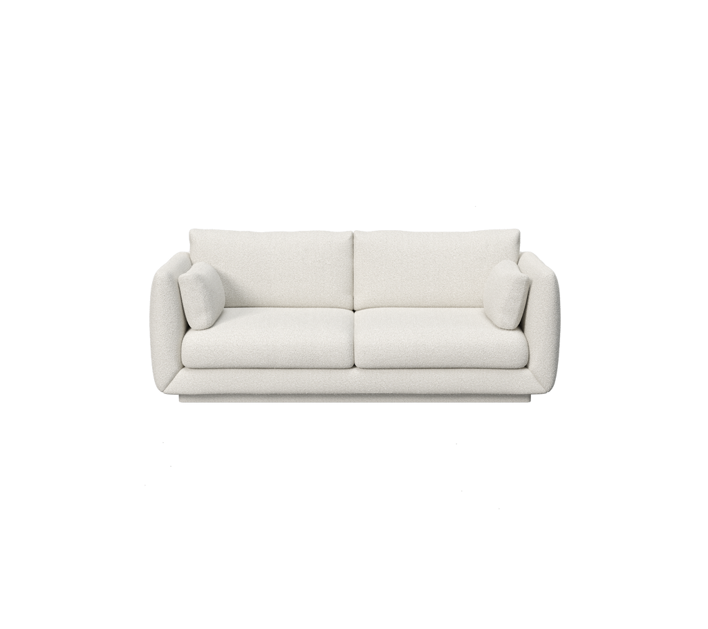 Canapé moderne minimaliste blanc avec des bras arrondis et des coussins moelleux.