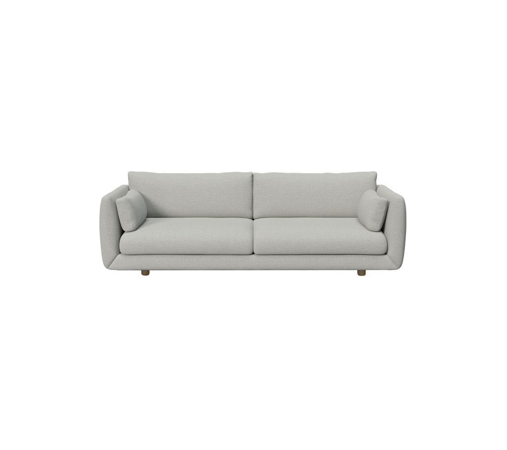 Canapé moderne gris clair avec des coussins ronds.