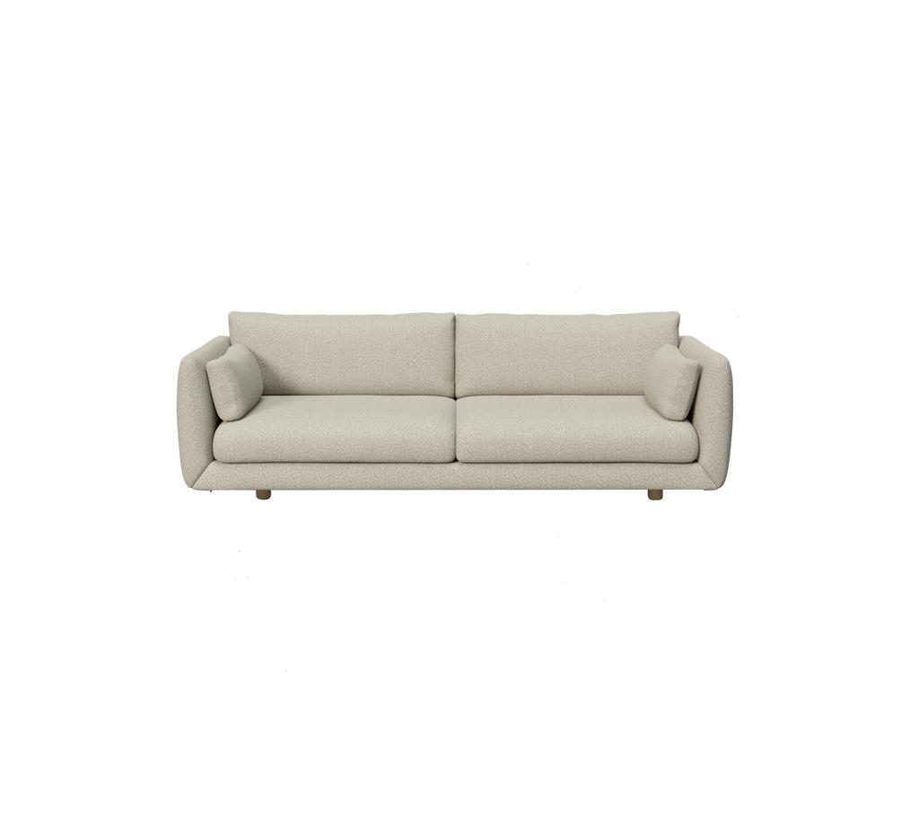 Canapé moderne de couleur brun clair avec des coussins ronds dans un design minimaliste.