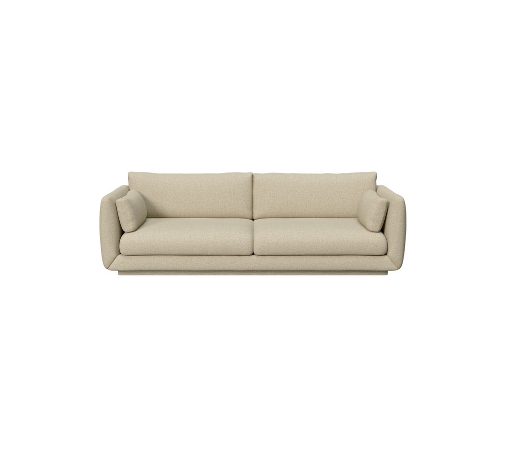 Canapé moderne marron clair avec des coussins dans un design minimaliste.