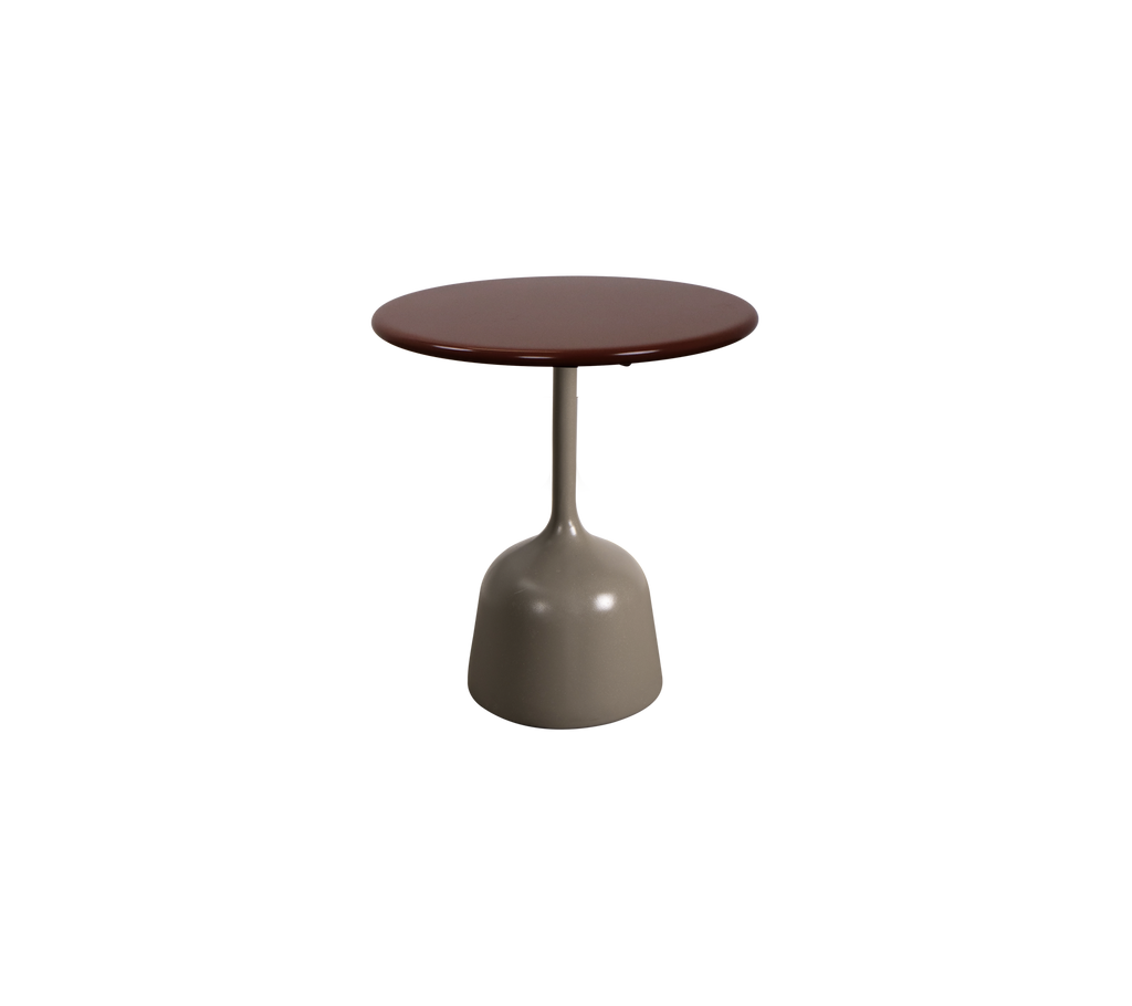 Table ronde bordeaux avec un socle taupe.