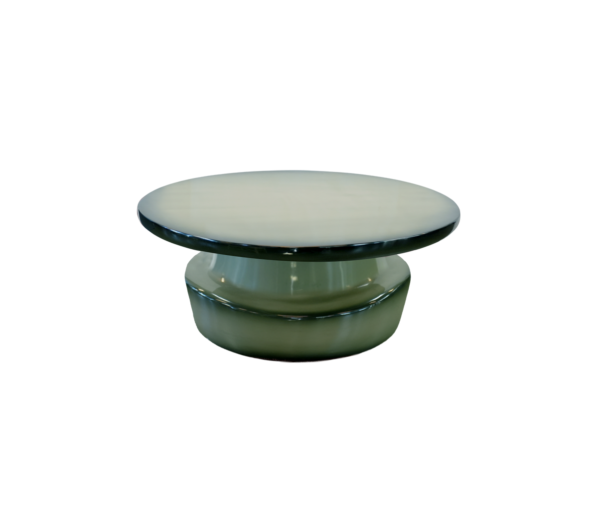 Table verte moderne avec un dessus rond lisse et une base sculpturale.