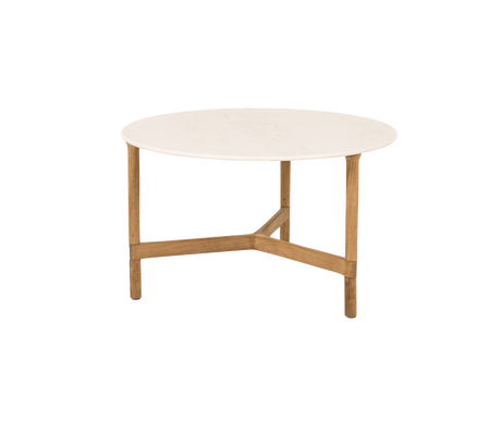 Table basse ronde avec un dessus blanc lisse et des pieds en bois clair, présentant un design moderne et minimaliste.