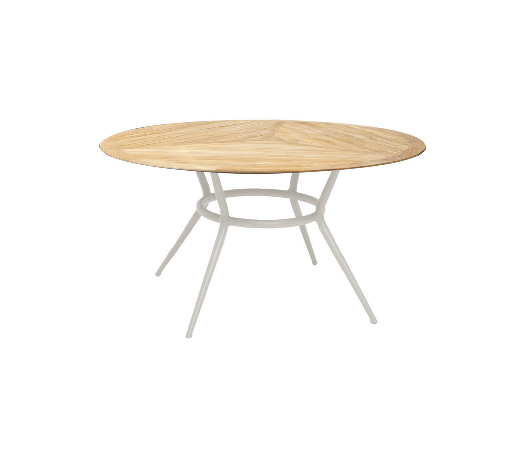 Table de sable ronde avec un design minimaliste et une base blanche.
