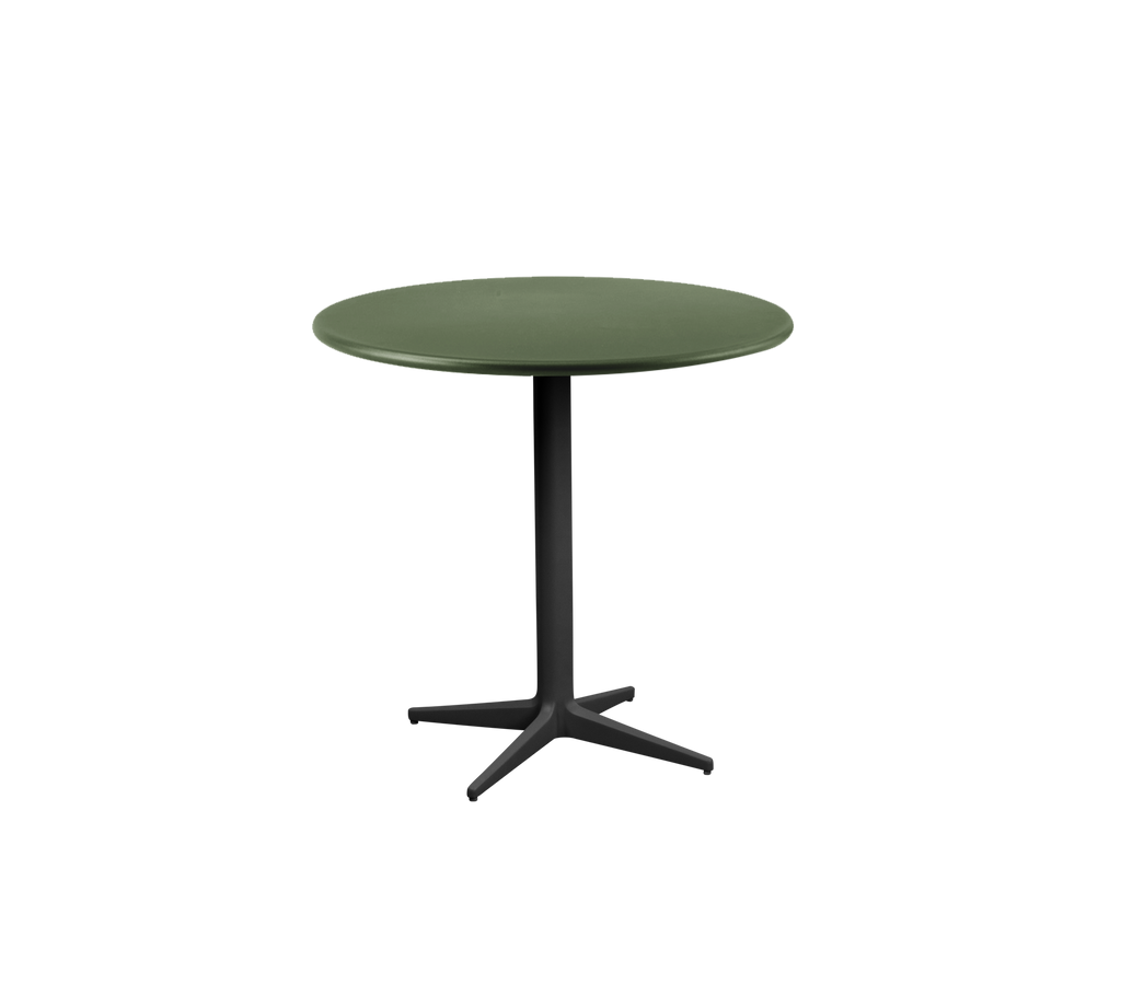 Table ronde verte moderne avec un pied noir.