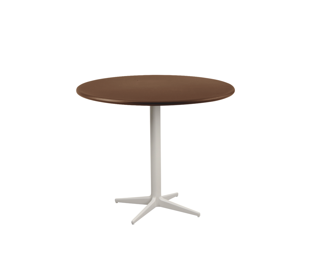 Table ronde brune moderne avec un pied blanc.