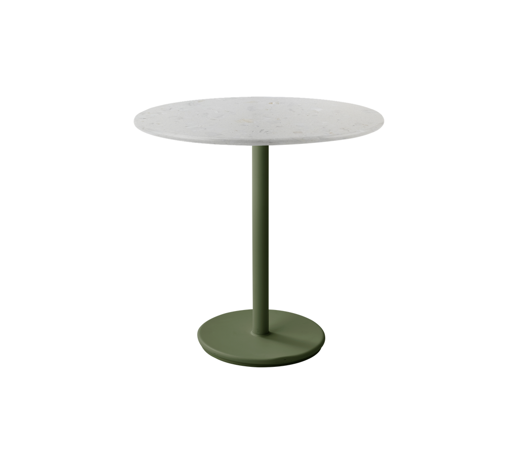 Table ronde avec une base vert foncé et un dessus blanc.