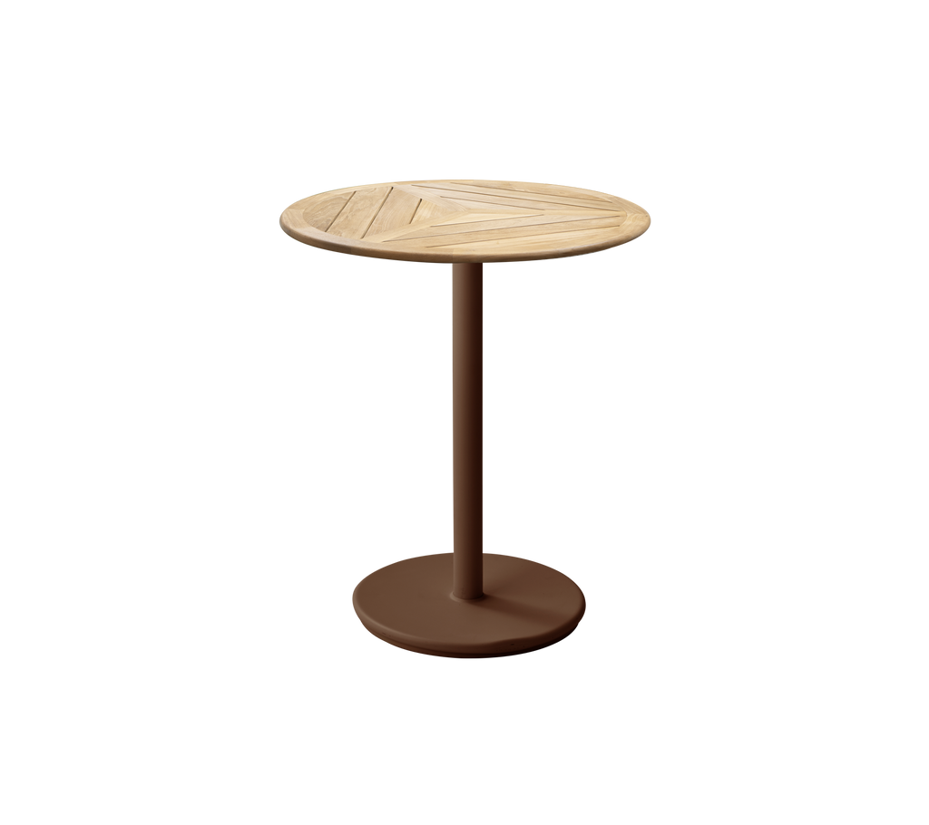 Table ronde rouge désert avec un plateau en bois dans un design simple.