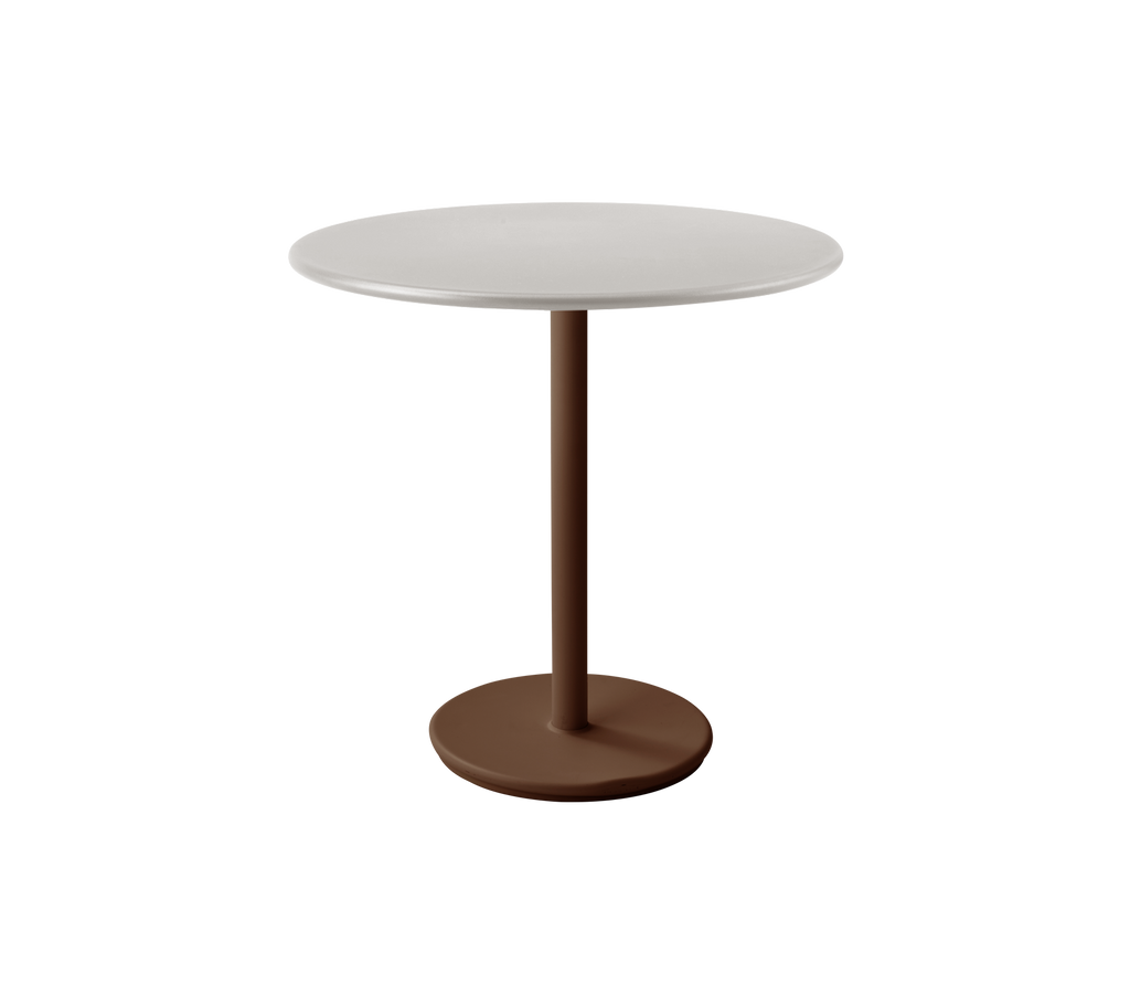 Table ronde moderne avec un dessus blanc et une base rouge désert.