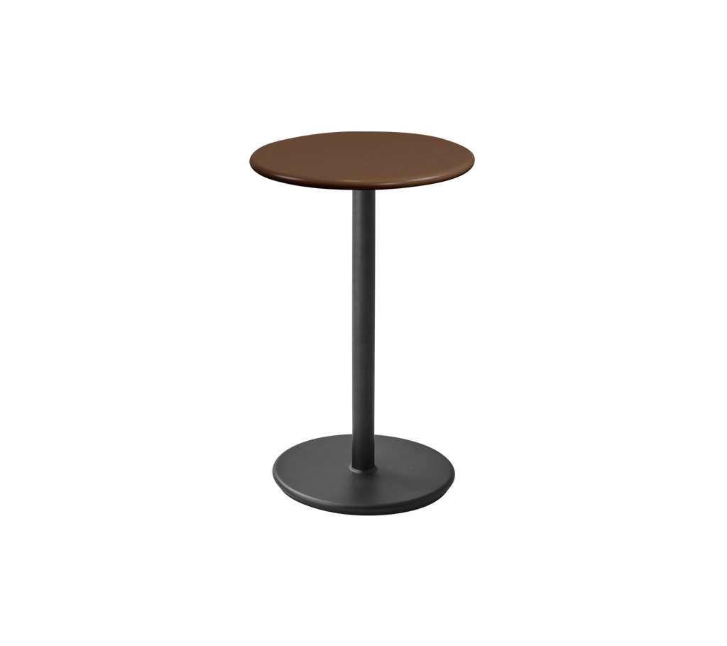 Table brune moderne avec un design épuré et un dessus rond.