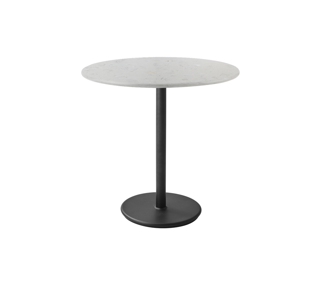 Table ronde grise avec un pied noir dans un design moderne.
