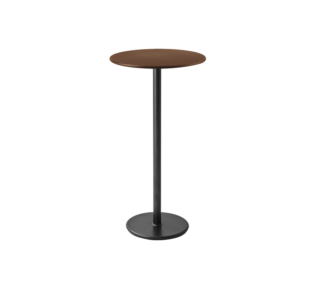 Une simple table brune avec un plateau rond et une base noire.