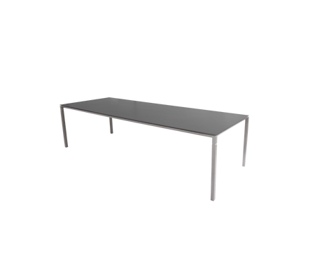 Une table élégante et moderne avec une surface plate et des pieds solides, conçue pour un usage polyvalent dans divers environnements.
