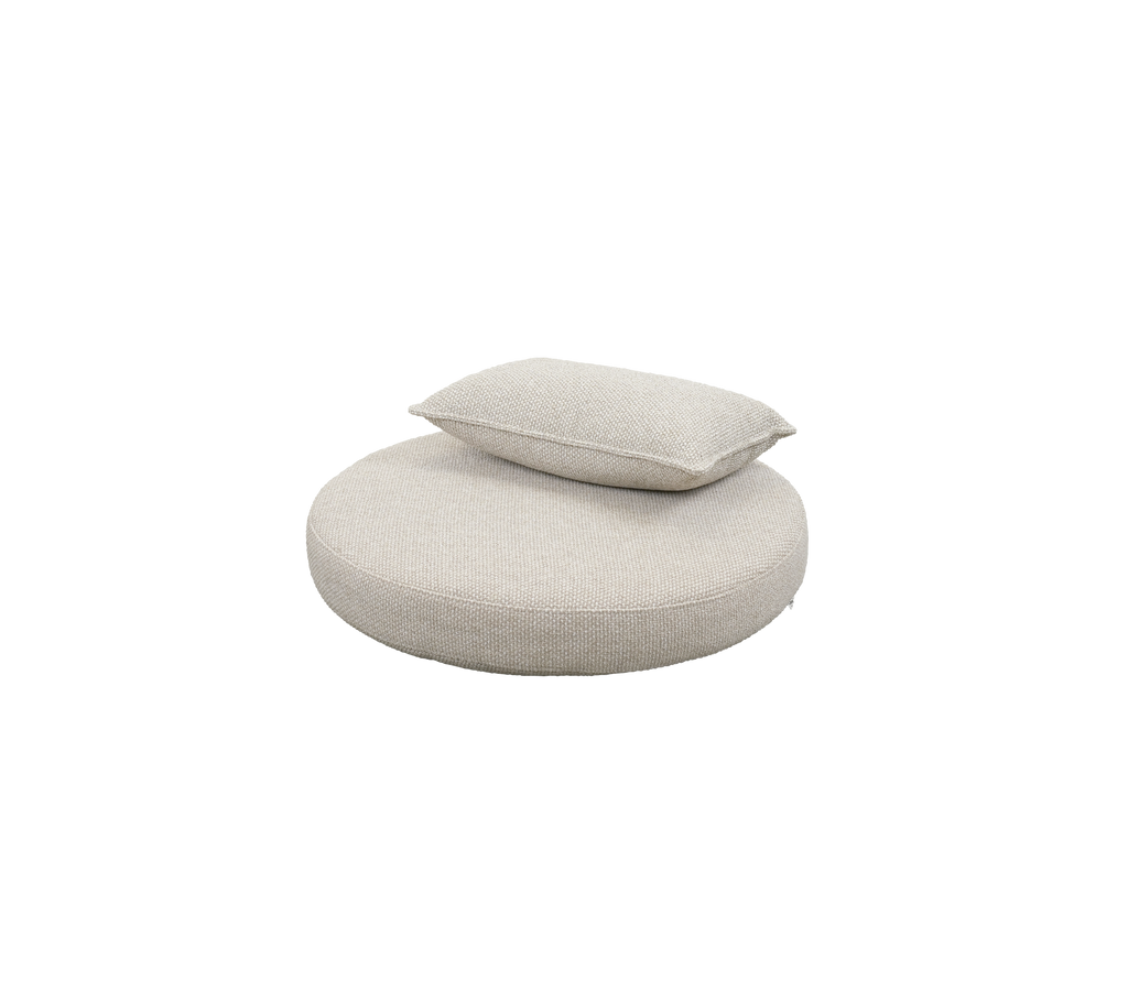 Coussin rond en sable du désert avec un petit coussin assorti.
