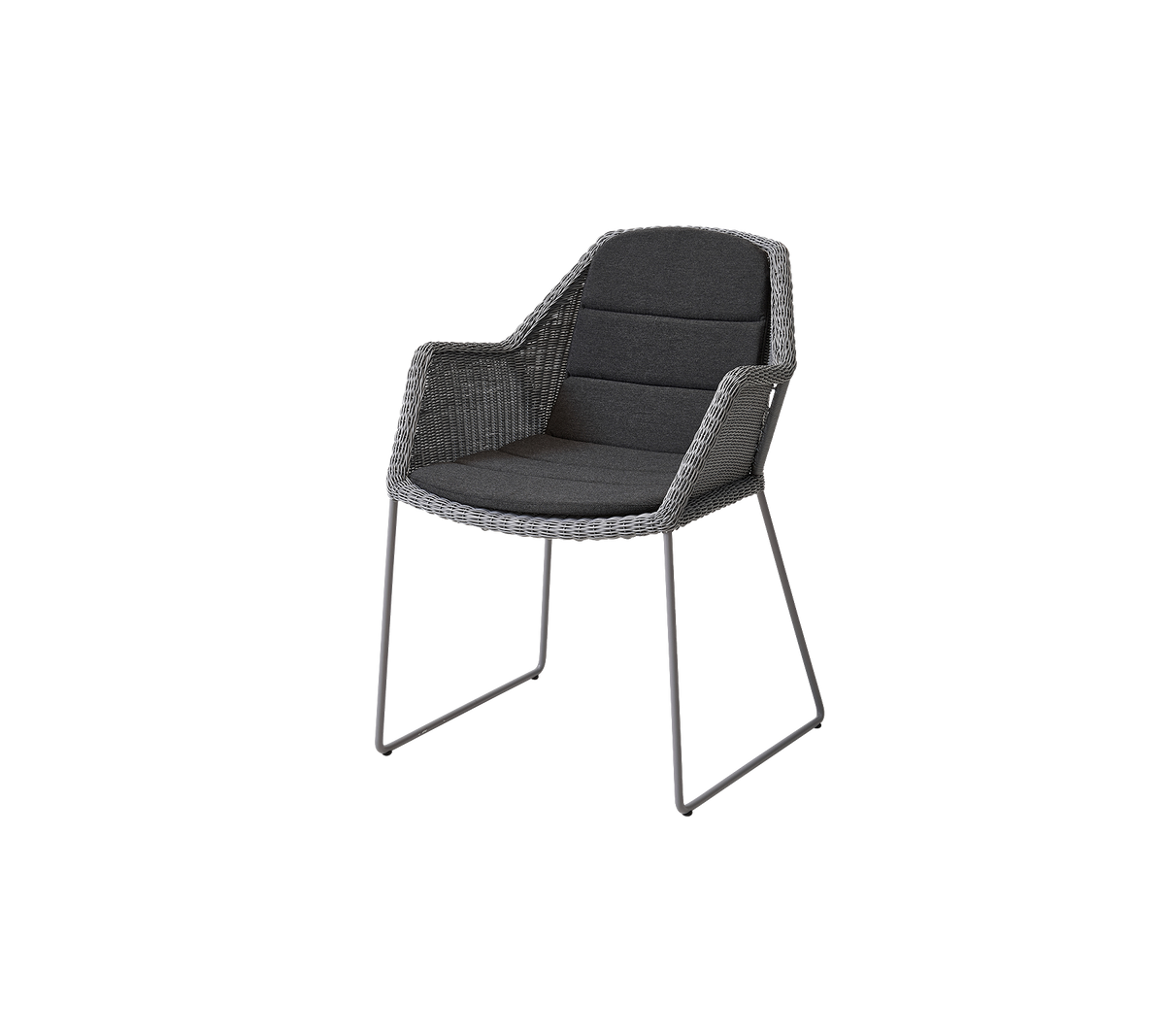Chaise élégante avec un design tissé, de coussins moelleux et des pieds métalliques fins, idéale pour les espaces modernes.
