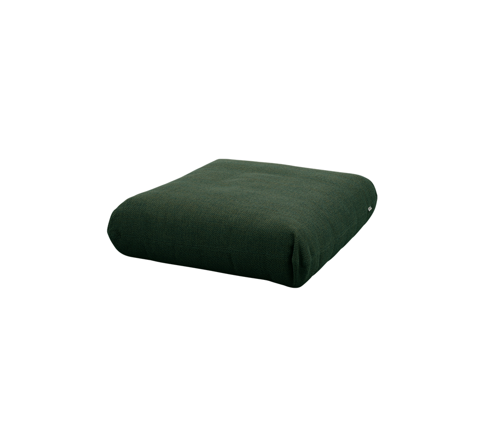 Coussin vert foncé au design simple et arrondi.