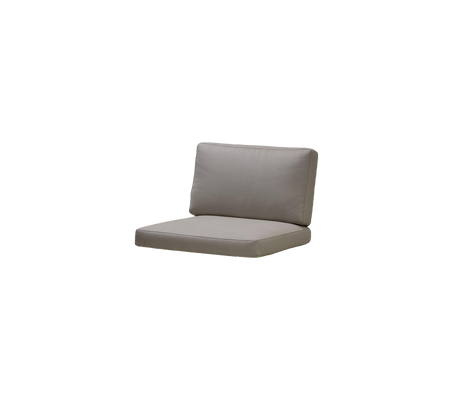 Coussin au design simple et moderne, avec un dossier et un siège épais dans une couleur neutre. Parfait pour le confort et le style.