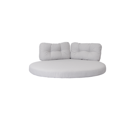 Siège rond rembourré avec deux coussins de soutien dans une couleur neutre, conçu pour le confort et la détente.