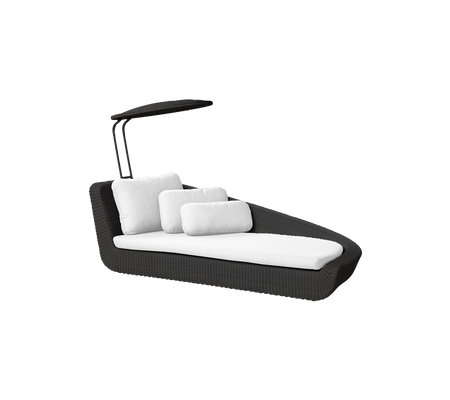 Chaise longue noire élégante avec coussins blancs et un auvent réglable pour l'ombre et le confort. Parfaite pour la détente.