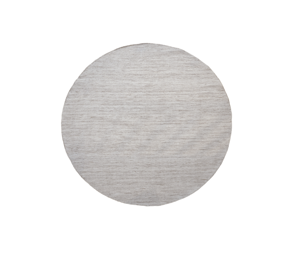 Table ronde en finition sablée multicolore.