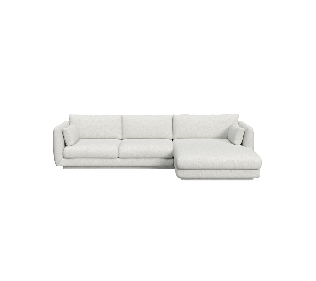 Canapé moderne gris clair au design minimaliste.