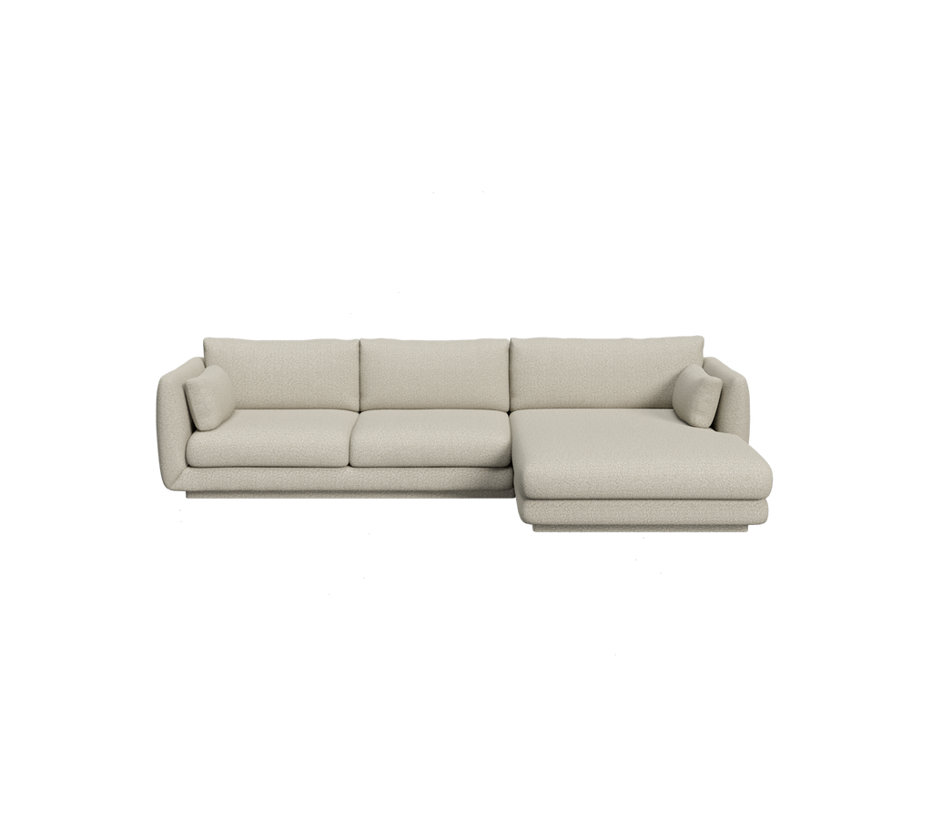 Canapé sectionnel marron clair au design minimaliste.