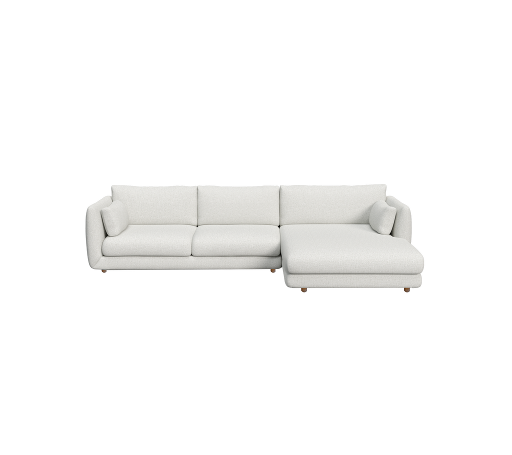 Canapé sectionnel moderne gris clair avec un design épuré.
