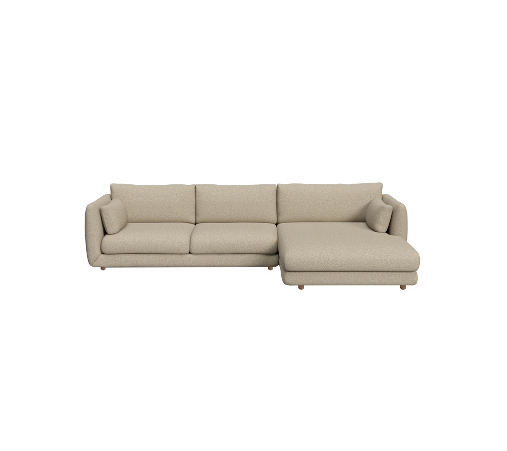 Canapé beige moderne avec un design sectionnel.