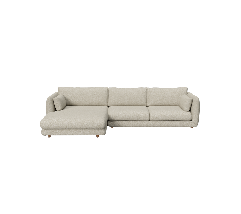 Canapé moderne marron clair avec un grand pouf.