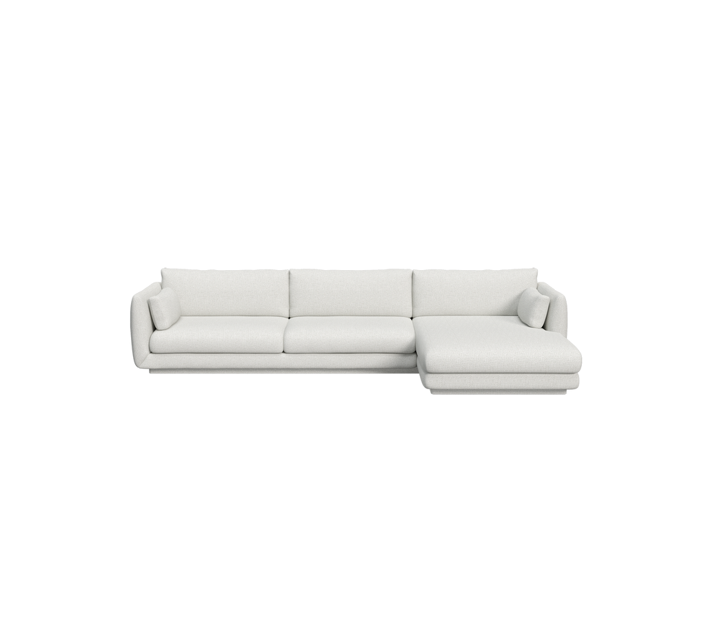 Canapé moderne gris clair avec un design sectionnel.