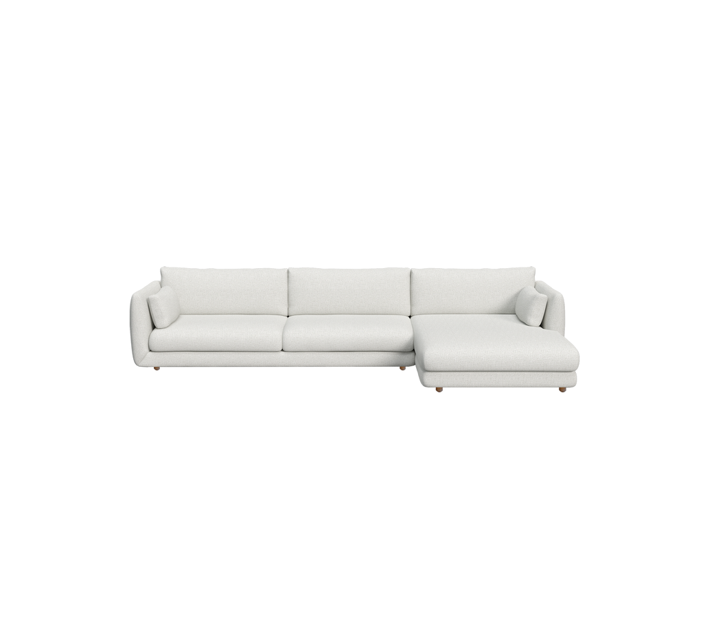 Canapé moderne gris clair au design minimaliste dans un cadre lounge.