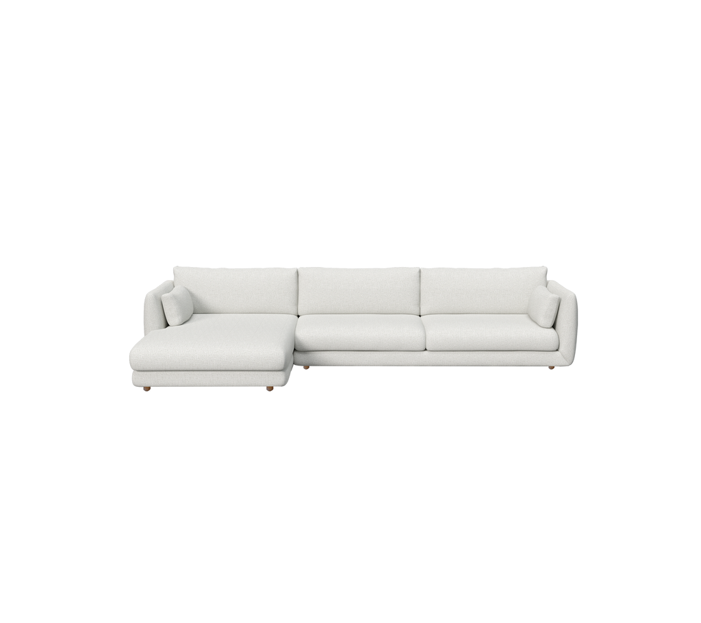 Canapé moderne gris clair avec des lignes épurées et un design minimaliste.