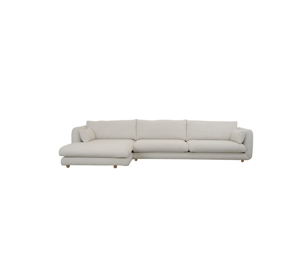 Canapé moderne couleur sable avec des lignes épurées dans un style minimaliste.