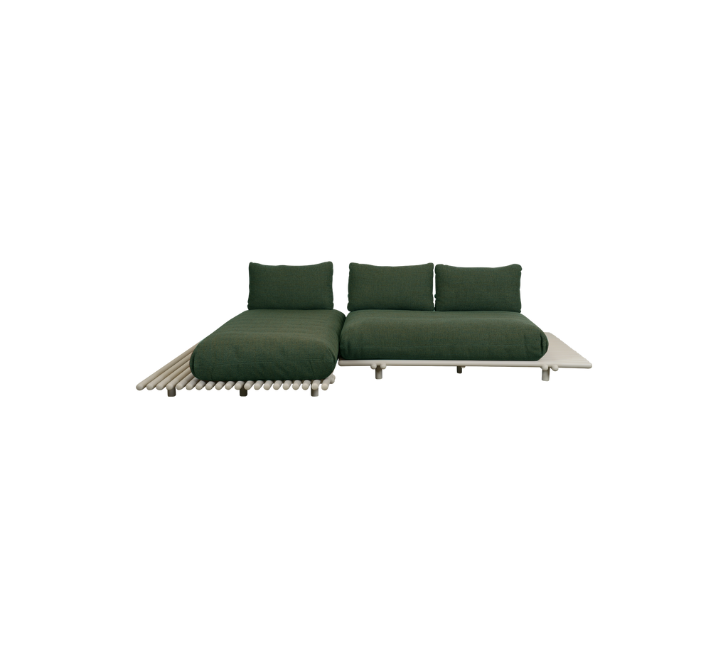 Canapé moderne vert foncé au design minimaliste.