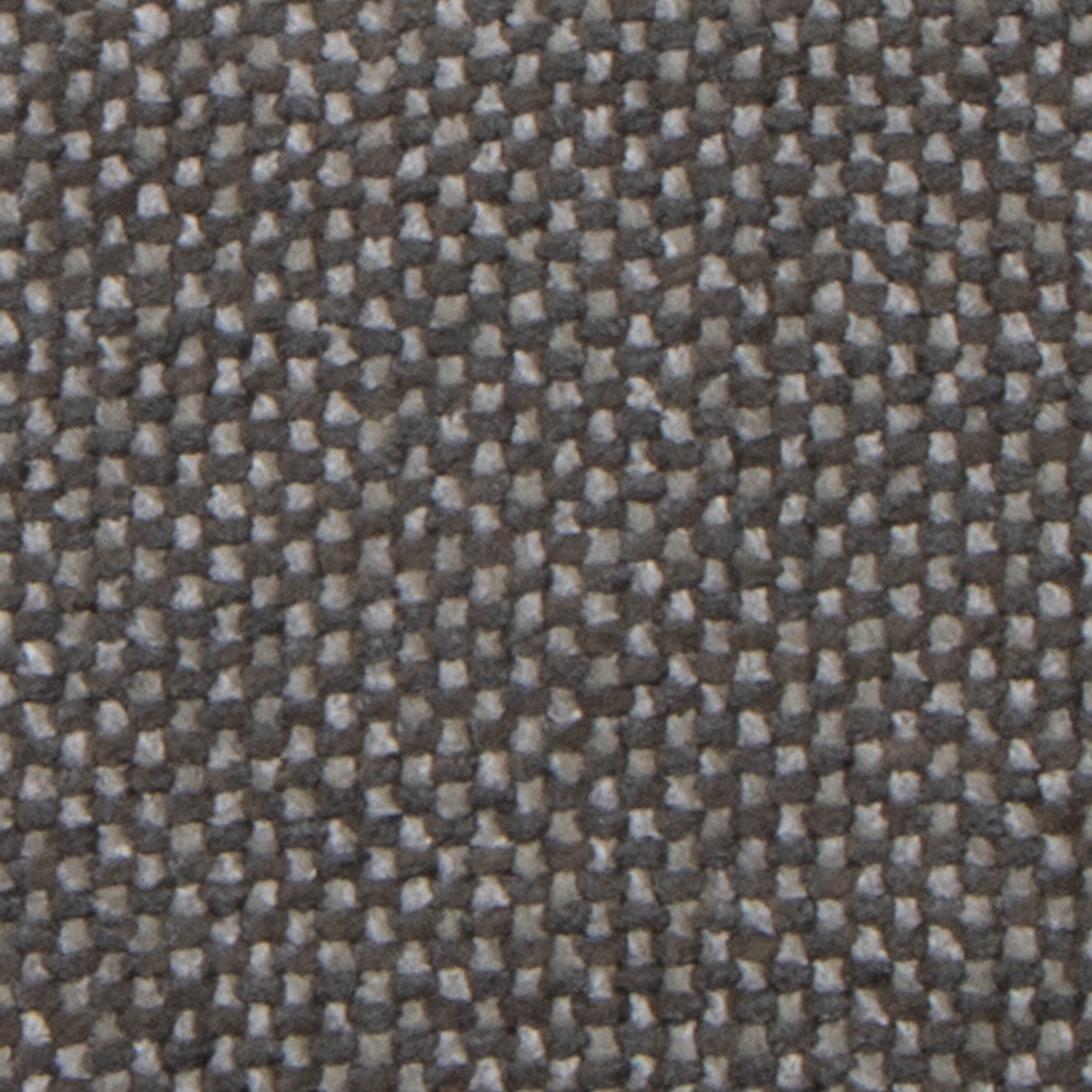 Gros plan d'un tissu gris texturé.